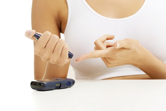 Diabetes patient measuring glucose level blood test using ultra